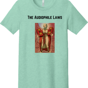 A mint green t-shirt featuring a cartoonish figure resembling a philosopher, holding large red speakers, with the text "The Audiophile Laws" above.